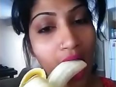 Sexy desi girl sucking banana like cock with moans