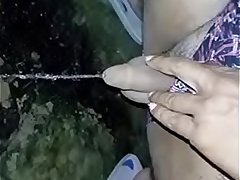 Pissing on ground in the night